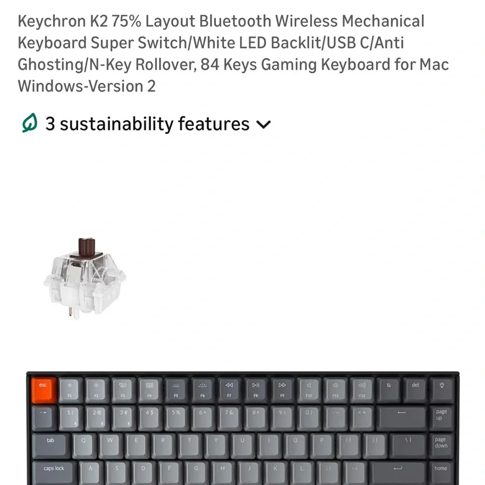Compact Gray Mechanical Keyboard with Orange Accent